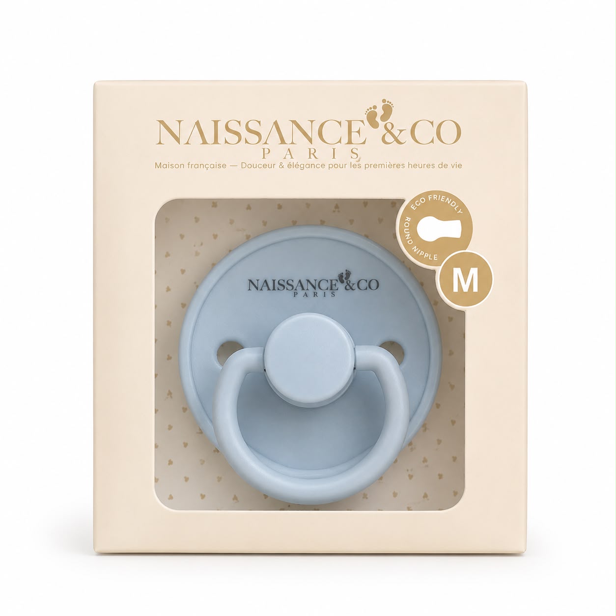 Tétine ronde en silicone bleu ciel dans son écrin — Naissance & Co Paris